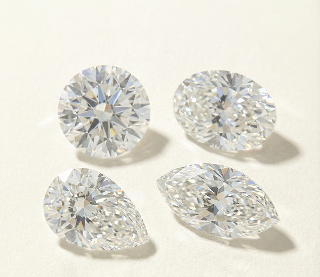 four diamonds in different shapes from Rare Carat, one of the best places to buy certified lab diamonds, displayed on a light colored background